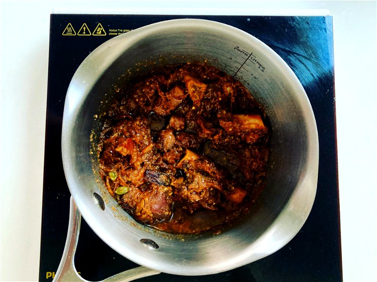 Image of Cook MuttonAdd mutton pieces to the pan and sauté for...