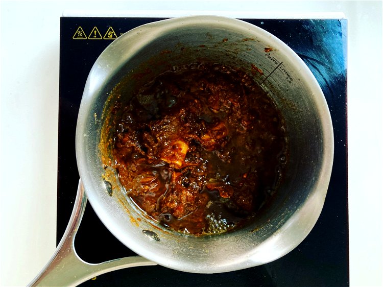 Image of Add GravyAdd masala mix and keep cooking the mutton on...
